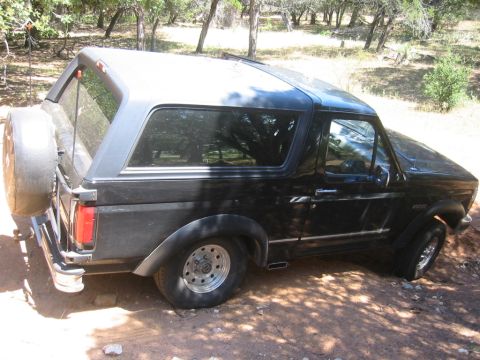 1995 Ford Bronco - This black Ford Bronco appears to be from the early to mid-1990s, not a 1995 model.