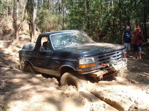 1993 Ford Bronco - This 1993 Ford Bronco is stuck in the mud on an off-road trail.