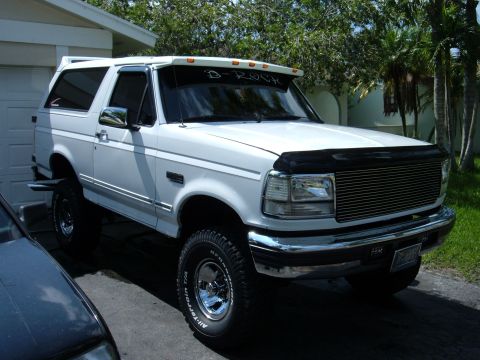 1995 Ford Bronco - This 1995 Ford Bronco features a custom chrome grille and a visor with 'D-ROCK' lettering.