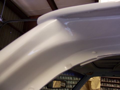 1993 Ford C-350 (Centurion Conversions) - Interior view of a vehicle undergoing paint preparation, with paint cans stocked in the background.