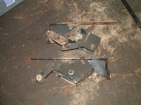 1994 Ford Bronco - These appear to be suspension or linkage components, possibly from a vehicle's drivetrain or chassis.
