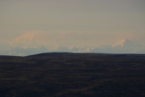 2003 Jeep TJ - A vast mountain landscape with snow-capped peaks visible in the distance.