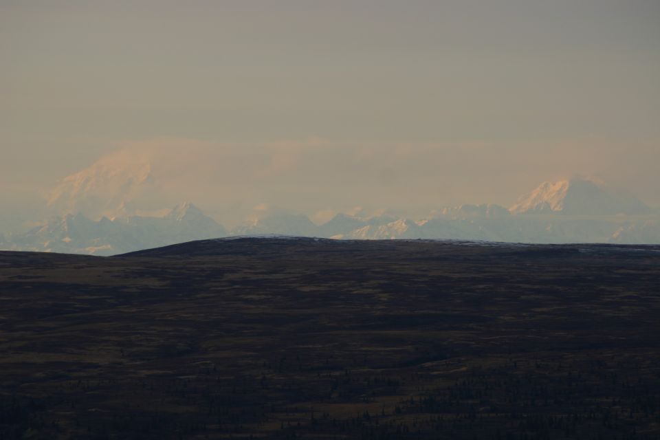 Mountain range under a hazy sky