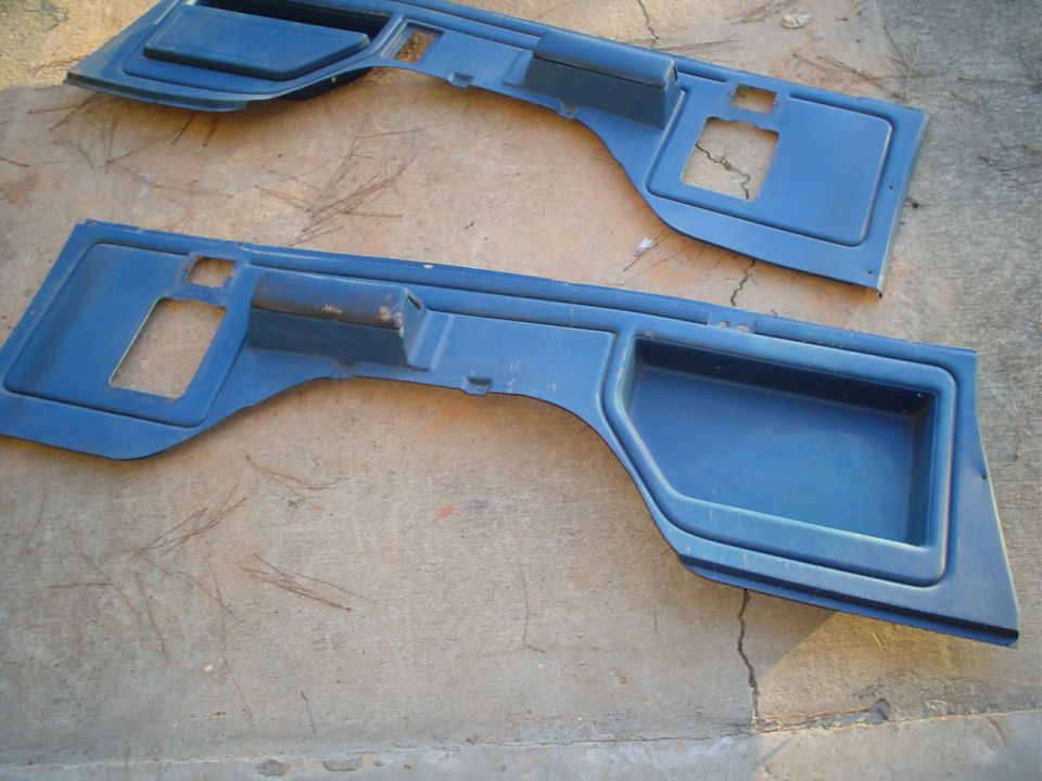 two blue plastic interior door panels