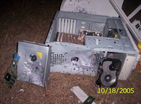 1995 Ford Bronco - CD drive on the left, what's left of the floppy in the center there (still in the case) and the HDD on the right.