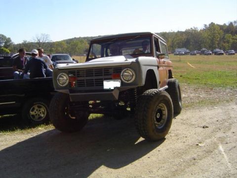 1979 Ford Bronco - Modified 1979 Ford Bronco sits ready for off-road action at an outdoor event.