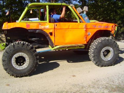1979 Ford Bronco - This heavily modified 1979 Ford Bronco is ready for off-road action, sporting a full roll cage and oversized tires.