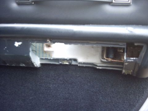 1991 Ford Crown Victoria LTD - Close-up view of an interior car part, showing mechanical components and wear.