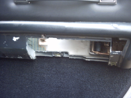Interior part with visible spring and metal components