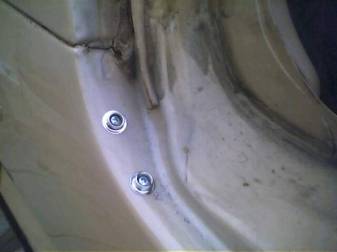 1994 Ford Bronco - the male snaps that have been installed with the supplied screw after a guide hole was drilled