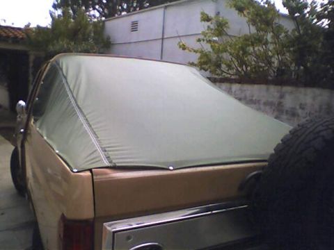 1994 Ford Bronco - This pickup truck's body style suggests an early 1980s model, not a 1994 Ford Bronco.
