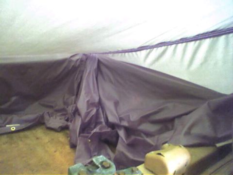 1994 Ford Bronco - A purple tarp covers unknown objects, with a watermark visible.