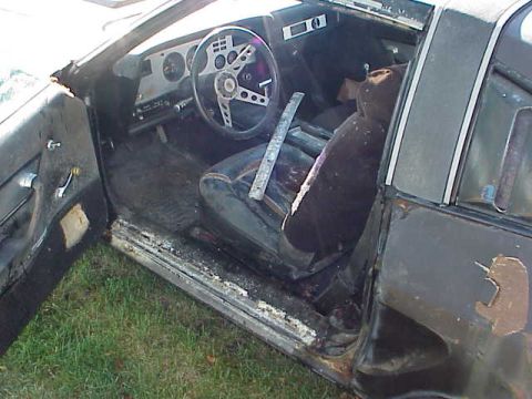 1978 Ford Mustang II - Interior view of a 1978 Ford Mustang II, showing the driver's side.