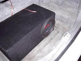 1992 Ford Crown Victoria - Subwoofer installed in the trunk of a car.