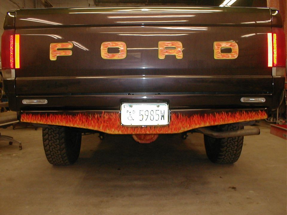 1991 Ford F-150 rear with flame graphics on bumper and tailgate letters