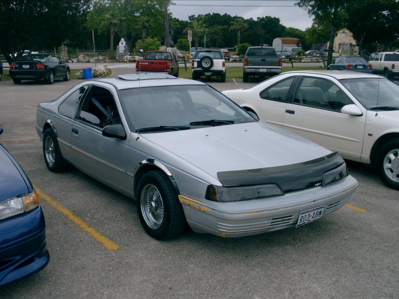 here's a pic from my first joint tccoa/fordbastards spring meet in austin in front of the oasis restaraunt, in 2004, had fun, although one of the sho guys rolled his car. :(