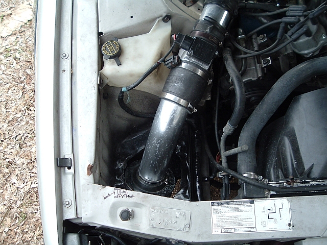 my cold air intake with a cone filter, it was relocated to redthunder recently, and replaced by the stock airbox of the 94.