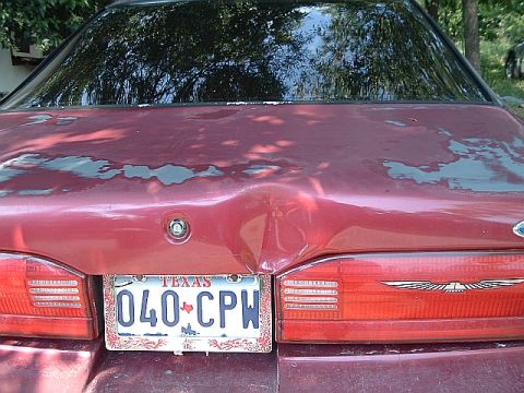 1994 Ford Thunderbird - this is the aftermath left in the wake of some idiot who backed into it at the supercenter crushing the trunk lid,