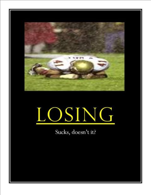 1996 Ford Mustang - A football player lies on the field with text that reads "LOSING Sucks, doesn't it?"