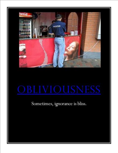 1996 Ford Mustang - A man stands at a concession stand, oblivious to the large poster of a woman's face next to him.