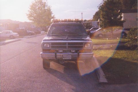 1990 Dodge Charger - This 1990 Dodge Ramcharger features a light bar mounted on the roof and a front license plate.