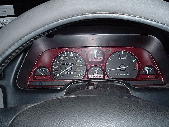 here's a dash shot. yes i painted the gauge surround and mounted the alarm led in the place of the factory security system's idiot light.