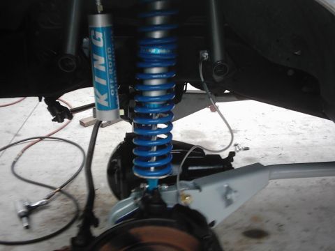 1978 Ford Bronco - The vehicle's suspension system is shown with a focus on the shock absorber and related components.