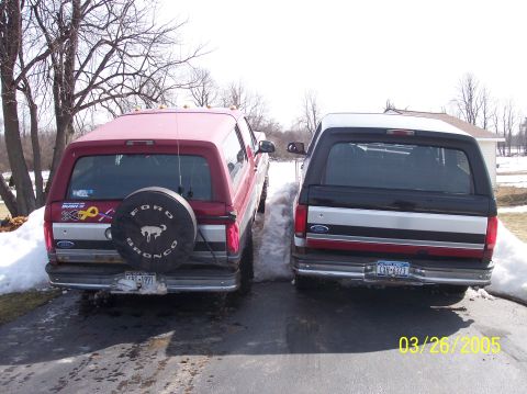1995 Ford Bronco - Two Ford Broncos are parked next to each other in a snowy driveway on March 26, 2005.