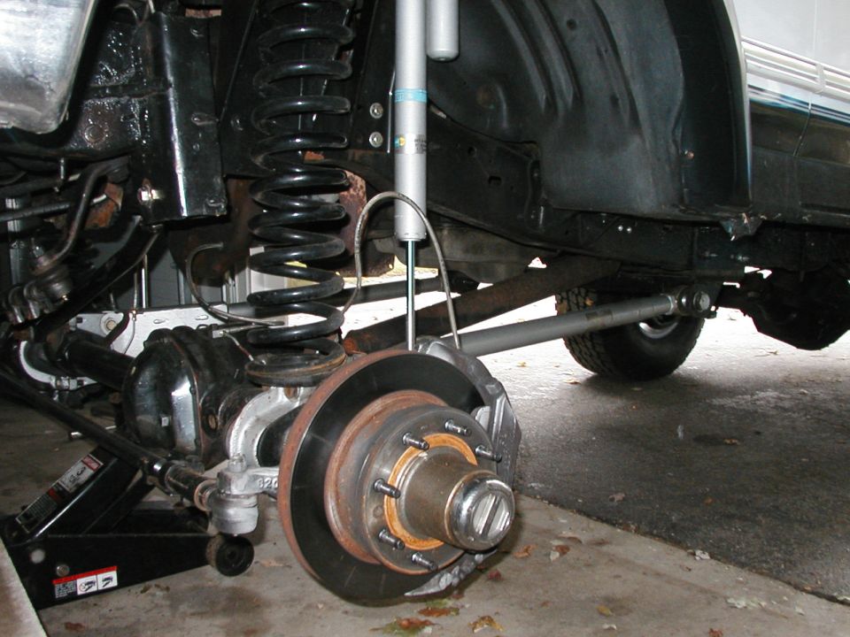 1994 Ford Bronco rear axle with disc brake assembly and Bilstein shock absorber