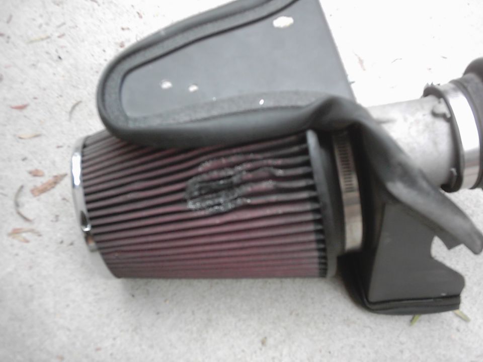 K&N air filter with intake tube and black plastic housing