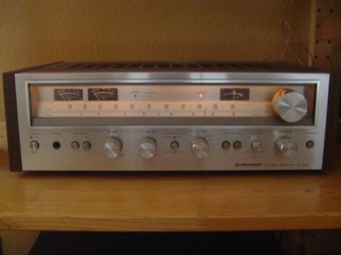 2000 Jeep TJ - Front view of a silver Pioneer stereo receiver, a large tuning dial and multiple control knobs.