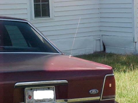 1994 Ford Crown Victoria - Rear view of a 1994 Ford Crown Victoria, showing the license plate and Ford emblem.