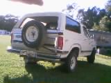 1986 Ford Bronco - Rear view of a 1986 Ford Bronco, showing the spare tire carrier and tailgate.