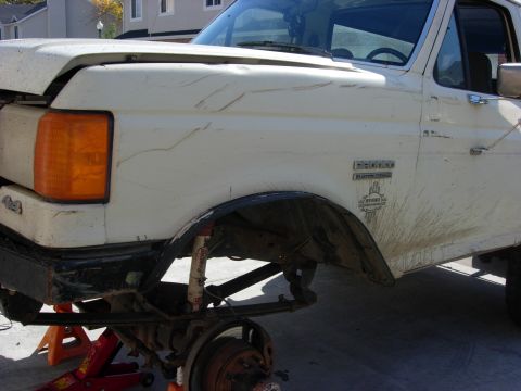 1987 Ford Bronco - This 1987 Ford Bronco features custom fender flares and a lifted suspension, indicating modifications beyond its original factory specifica…