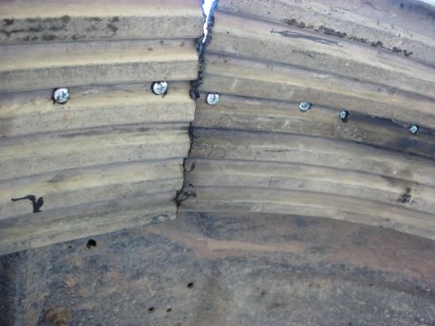 1987 Ford Bronco - This fender flare is cracked and has been repaired with screws.