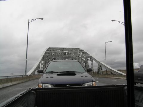 1997 Subaru Impreza - Driving across a bridge on a cloudy day, following a Subaru Impreza.
