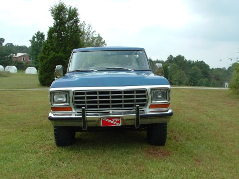 1979 Ford Bronco - This 1979 Ford Bronco is shown from the front, with a prominent grille and bumper.