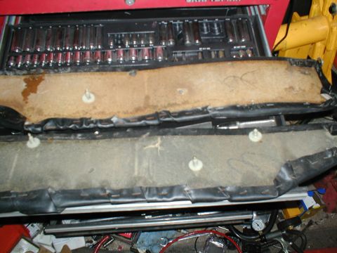 1979 Ford Bronco - Close-up of an interior door panel, showing its construction and mounting points.