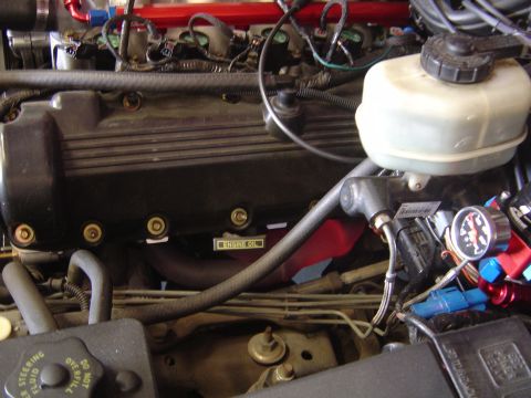 1992 Ford Crown Victoria - Engine bay detail with a gauge and various engine components visible.