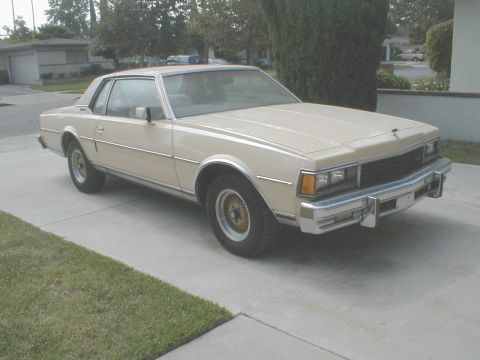 1978 Chevrolet Caprice - This 1977 Chevrolet Caprice coupe is seen from the front 3/4 angle on a concrete driveway.