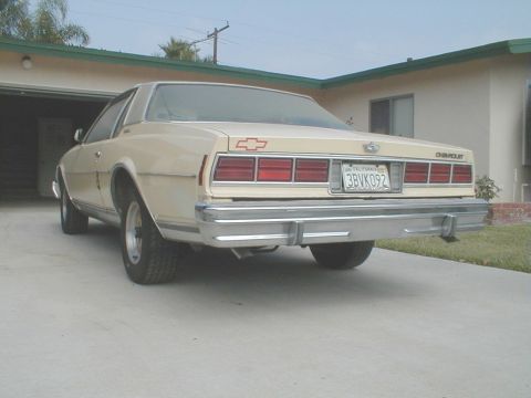 1978 Chevrolet Caprice - Rear view of a cream 1977 Chevrolet Caprice coupe parked in a driveway.