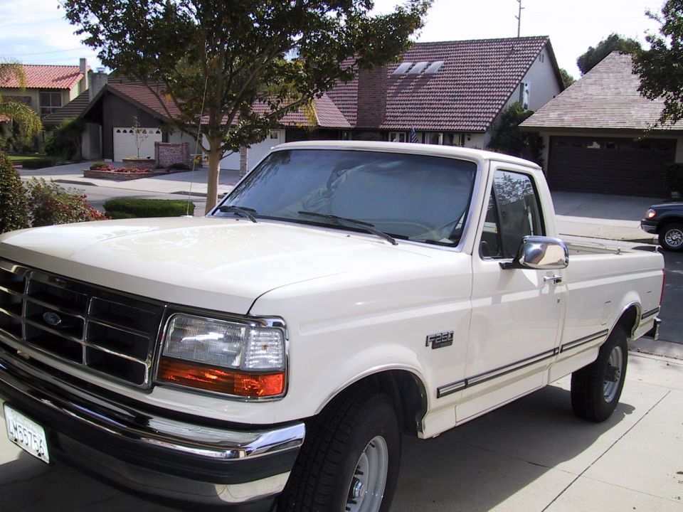 1992 Ford F-250 pickup truck parked in driveway