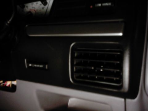 1978 Ford Bronco - A close-up view of the interior dashboard, focusing on the air vent and surrounding trim.