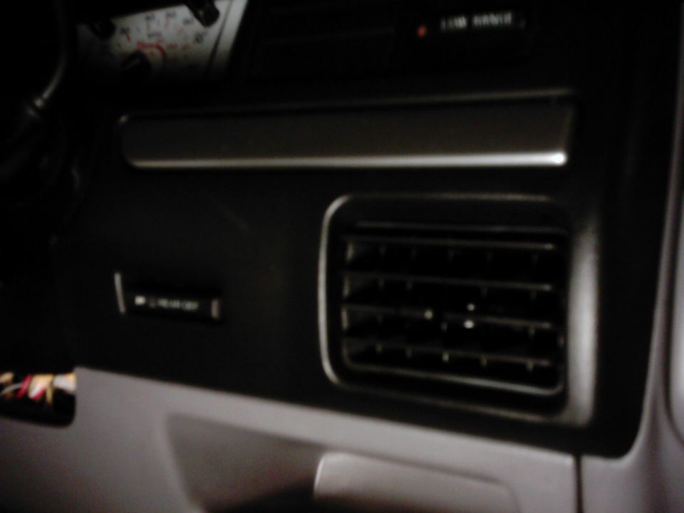 Interior dashboard air vent and trim detail