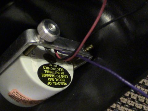 1997 Ford Probe - Electronic component with warning labels about internal electronics and removal.