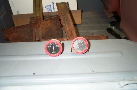 1954 Jeep Wrangler - Vintage AMPERES and FUEL gauges are visible, along with rusty metal components.