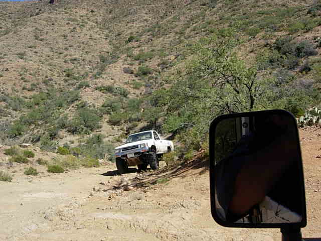White 1981 Ford F-150 on a desert trail