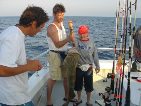1999 Jeep TJ - A successful fishing trip at sea with a large catch.