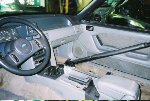 1989 Ford Mustang - Interior view of a 1989 Ford Mustang, highlighting the dashboard and driver's side controls.