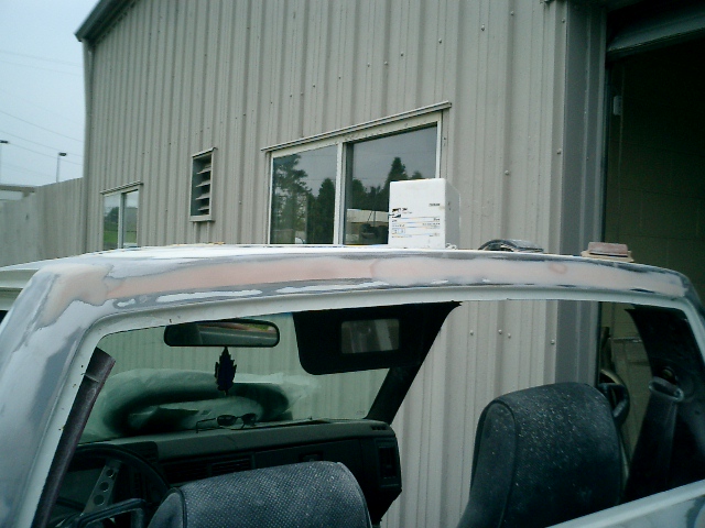 1991 Chevrolet S10 cab roof with body filler applied, interior visible